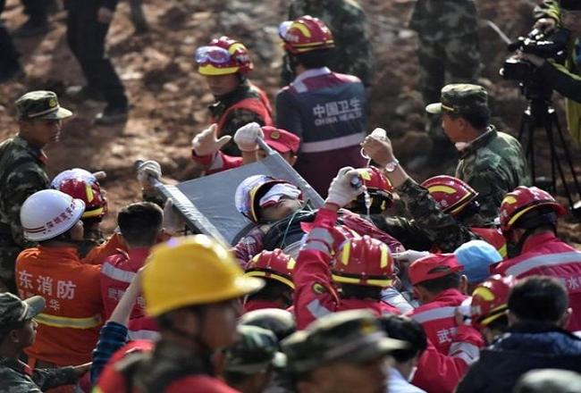 Man found alive in rubbles, 60 hours after China landslide