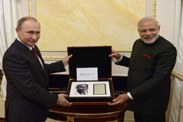 Putin gifts Mahatma’s notes, Indian sword to Modi