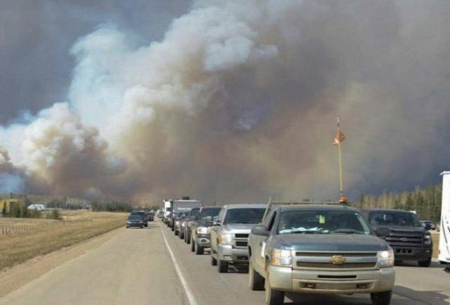 Alberta declares emergency as fires threaten Canada oil town